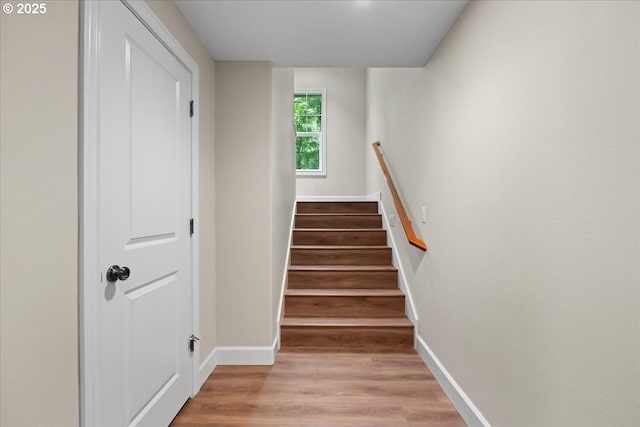 711 NW 94th Ter, Portland, OR 97229 - staircase with wood finished floors and baseboards
