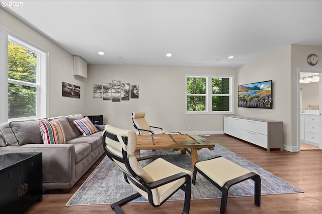 711 NW 94th Ter, Portland, OR 97229 - living room featuring healthy amount of natural light, wood finished floors, and recessed lighting