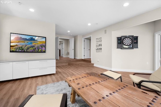 711 NW 94th Ter, Portland, OR 97229 - living room with light wood-type flooring and recessed lighting