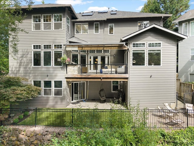 711 NW 94th Ter, Portland, OR 97229 - back of house featuring a patio and a fenced backyard