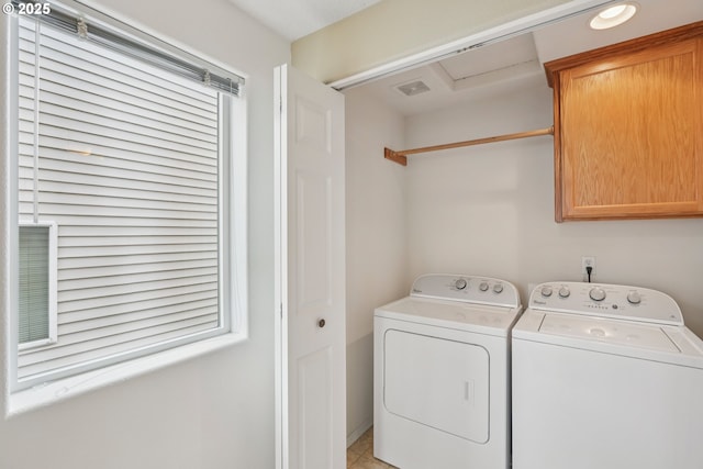 6538 NE Forest Ln, Hillsboro, OR 97124 - washroom featuring cabinet space and washing machine and dryer