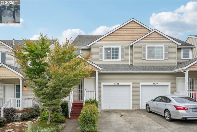 6538 NE Forest Ln, Hillsboro, OR 97124 - multi unit property featuring driveway, an attached garage, and a shingled roof