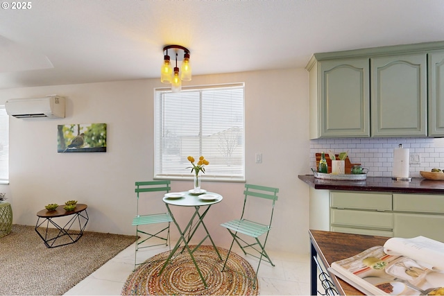 dining space featuring a wall unit AC