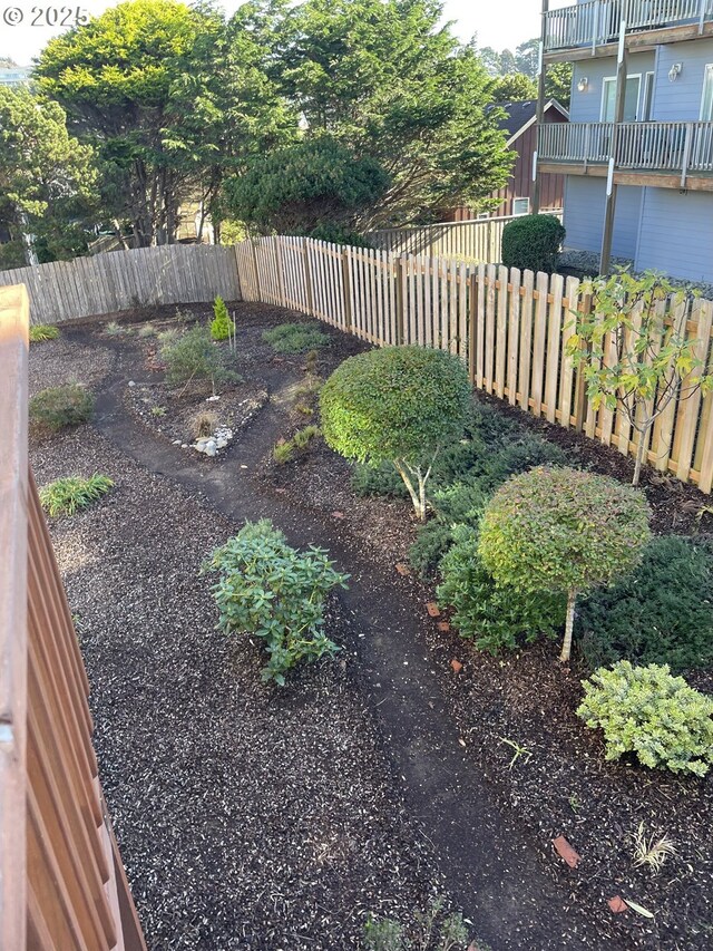 view of yard with a fenced backyard