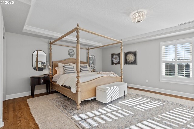 14218 NW Dunbar Ln, Portland, OR 97231 - bedroom featuring baseboards and wood finished floors