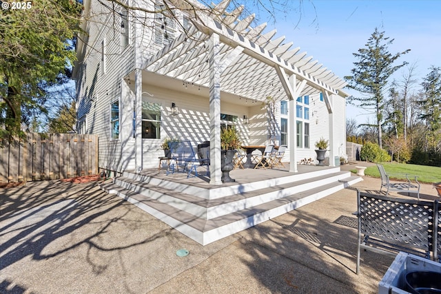 exterior space with fence and a pergola