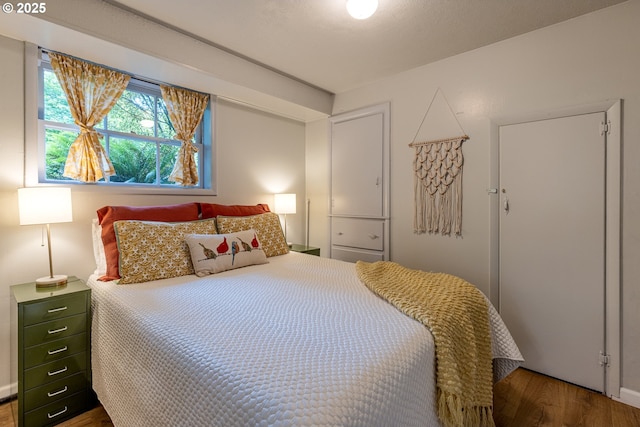 8836 SW 56th Ave, Portland, OR 97219 - bedroom featuring wood finished floors and baseboards