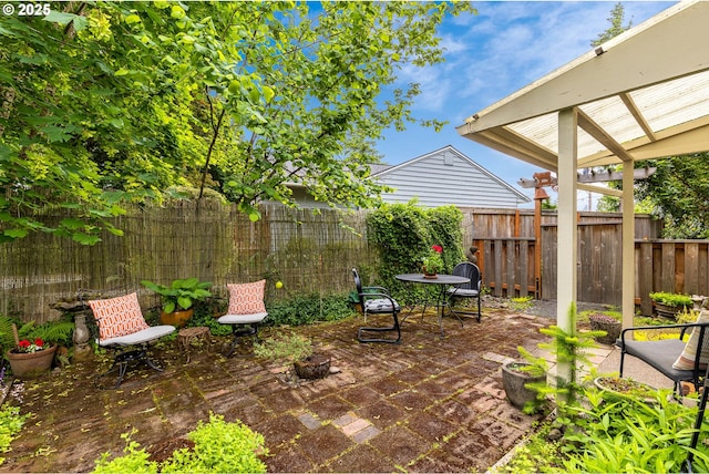 8836 SW 56th Ave, Portland, OR 97219 - fenced backyard with a patio