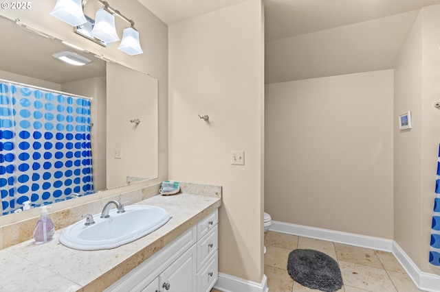 33310 Cape Kiwanda Dr, Pacific City, OR 97135 - full bathroom featuring vanity, toilet, baseboards, and tile patterned flooring