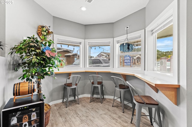 33310 Cape Kiwanda Dr, Pacific City, OR 97135 - dining space with wood finished floors, baseboards, and recessed lighting