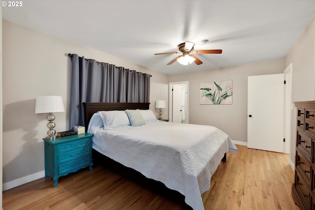 bedroom with ceiling fan and light wood-type flooring