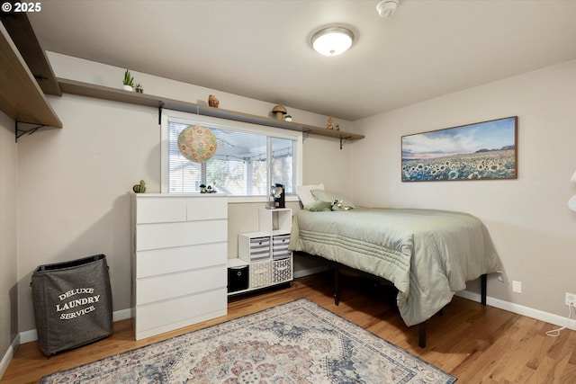 bedroom featuring light wood-type flooring