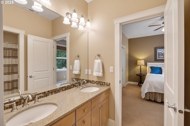 20905 NE 96th Ave, Battle Ground, WA 98604 - full bathroom with ceiling fan, double vanity, and baseboards