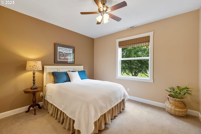 20905 NE 96th Ave, Battle Ground, WA 98604 - bedroom featuring light colored carpet, baseboards, and a ceiling fan