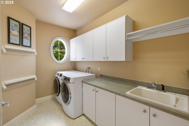 20905 NE 96th Ave, Battle Ground, WA 98604 - laundry room with cabinet space, separate washer and dryer, baseboards, and light flooring