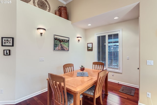 dining space featuring dark hardwood / wood-style flooring