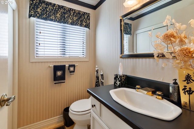 4825 SE 33rd Ave, Portland, OR 97202 - bathroom with vanity, wallpapered walls, and ornamental molding