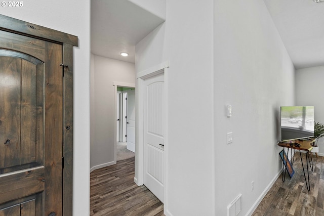 69857 Stage Rd, North Bend, OR 97459 - hall featuring wood finished floors and baseboards