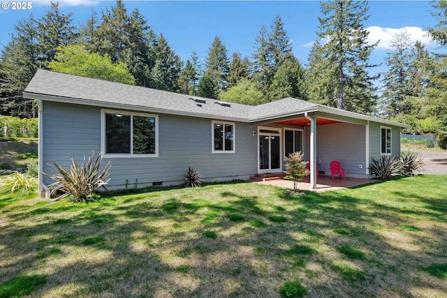69857 Stage Rd, North Bend, OR 97459 - rear view of property with a yard, a patio area, and a shingled roof