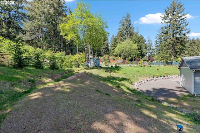 69857 Stage Rd, North Bend, OR 97459 - view of yard featuring view of wooded area