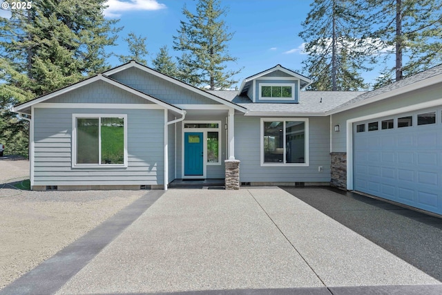69857 Stage Rd, North Bend, OR 97459 - view of front of property with crawl space, an attached garage, and roof with shingles