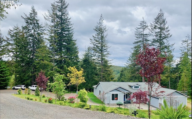 69857 Stage Rd, North Bend, OR 97459 - view of subject property featuring a heavily wooded area
