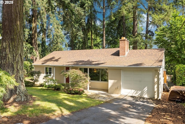 1725 Southshore Blvd, Lake Oswego, OR 97034 - single story home featuring a chimney, a garage, asphalt driveway, a shingled roof, and a front yard