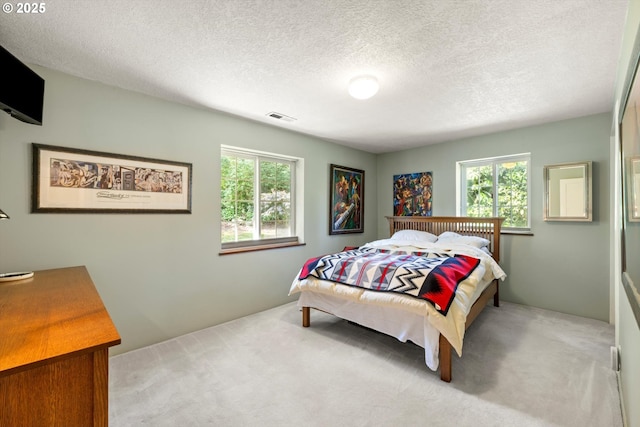 1725 Southshore Blvd, Lake Oswego, OR 97034 - carpeted bedroom with multiple windows and a textured ceiling
