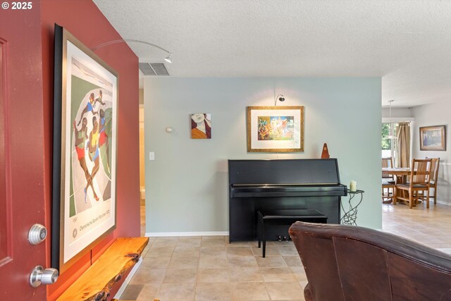 1725 Southshore Blvd, Lake Oswego, OR 97034 - entrance foyer featuring a textured ceiling and light tile patterned flooring