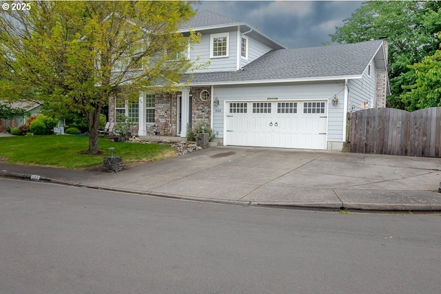 500 Lynnbrook Dr, Eugene, OR 97404 - traditional-style house with a garage, concrete driveway, and a shingled roof