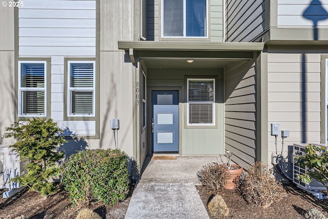 property entrance with central air condition unit