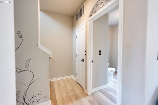 10955 SW 130th Ave, Tigard, OR 97223 - hallway with light wood finished floors and baseboards