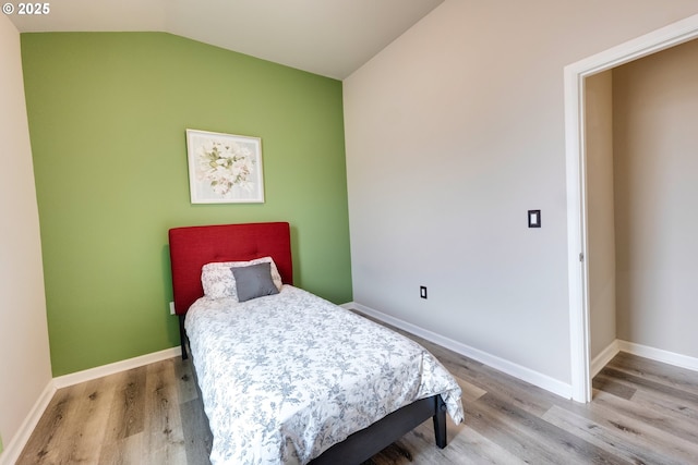 10955 SW 130th Ave, Tigard, OR 97223 - bedroom with wood finished floors and vaulted ceiling