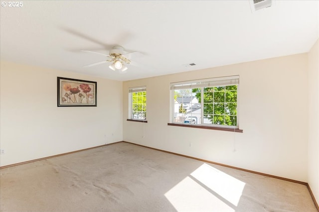1224 Alyssum Ave, Forest Grove, OR 97116 - carpeted spare room with baseboards, a ceiling fan, and visible vents