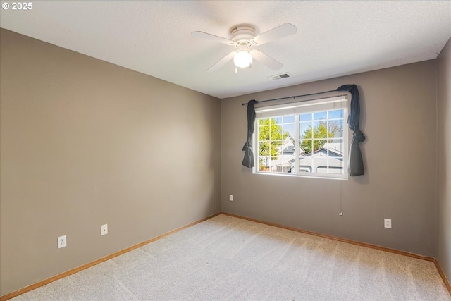 1224 Alyssum Ave, Forest Grove, OR 97116 - spare room featuring carpet, visible vents, a ceiling fan, and baseboards