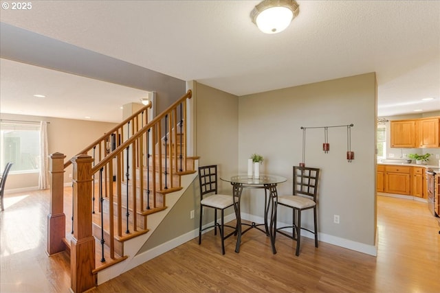 1224 Alyssum Ave, Forest Grove, OR 97116 - stairway featuring baseboards, recessed lighting, and wood finished floors