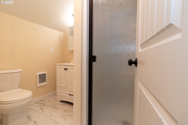 bathroom featuring vanity, baseboards, toilet, marble finish floor, and heating unit