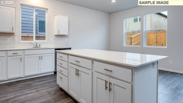 2131 NE 3rd Ave, Battle Ground, WA 98604 - kitchen with a sink, dark wood-style floors, white cabinets, light countertops, and recessed lighting