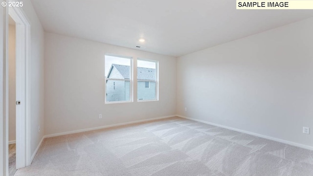 2131 NE 3rd Ave, Battle Ground, WA 98604 - unfurnished room with light colored carpet, baseboards, and recessed lighting