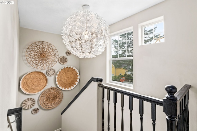 interior details featuring a notable chandelier