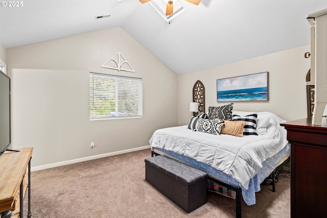 carpeted bedroom featuring ceiling fan and vaulted ceiling