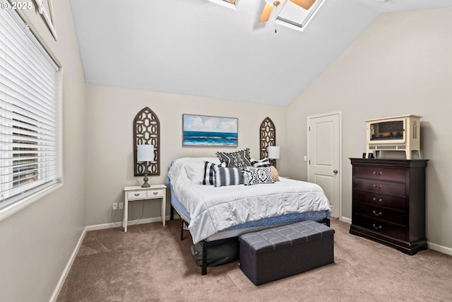 bedroom with high vaulted ceiling, light carpet, and ceiling fan