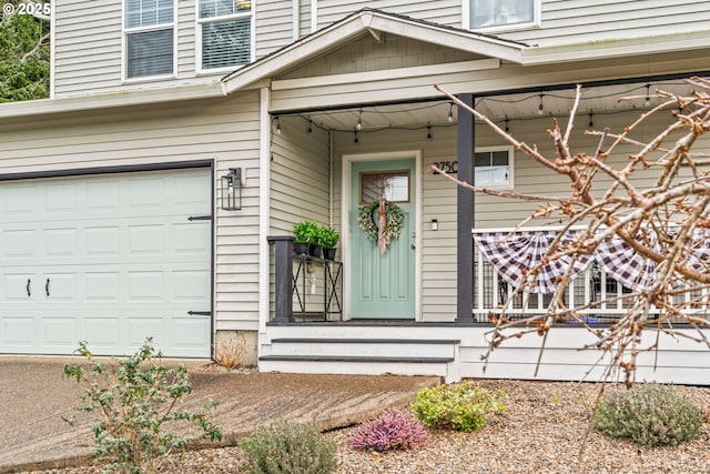 view of exterior entry featuring a garage