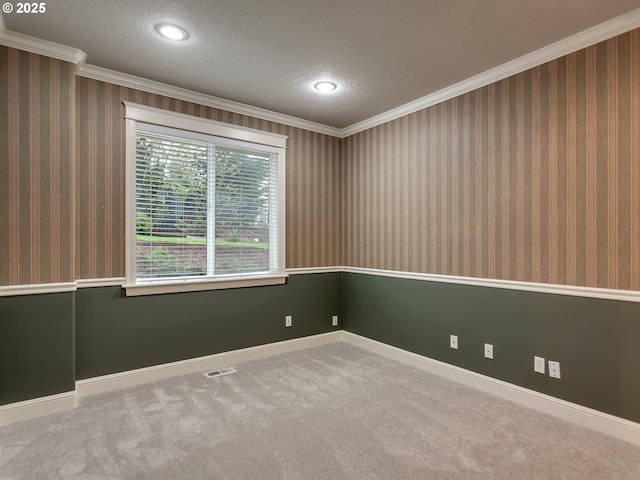 3808 Fairhaven Dr, West Linn, OR 97068 - carpeted empty room with ornamental molding, a textured ceiling, and recessed lighting