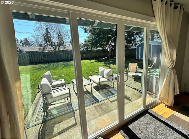 doorway with french doors and plenty of natural light