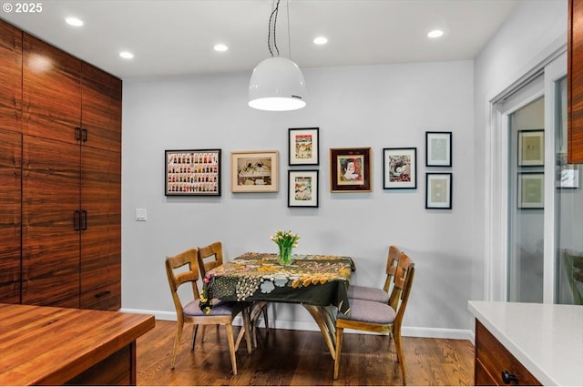 2975 SW Canterbury Ln, Portland, OR 97205 - dining area featuring baseboards, dark wood-style floors, and recessed lighting