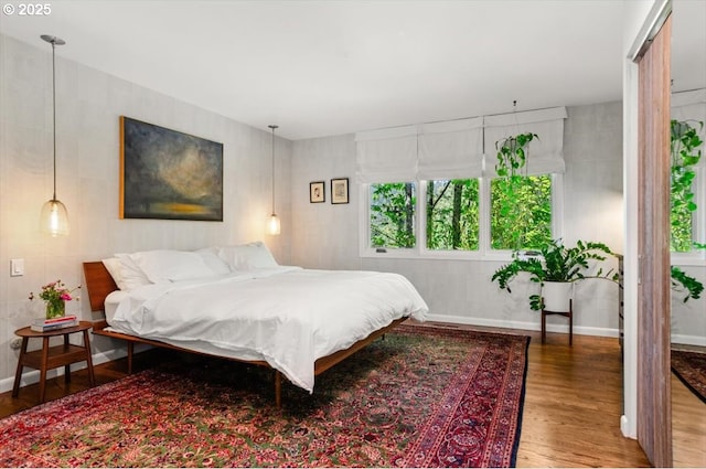 2975 SW Canterbury Ln, Portland, OR 97205 - bedroom with wood finished floors and baseboards