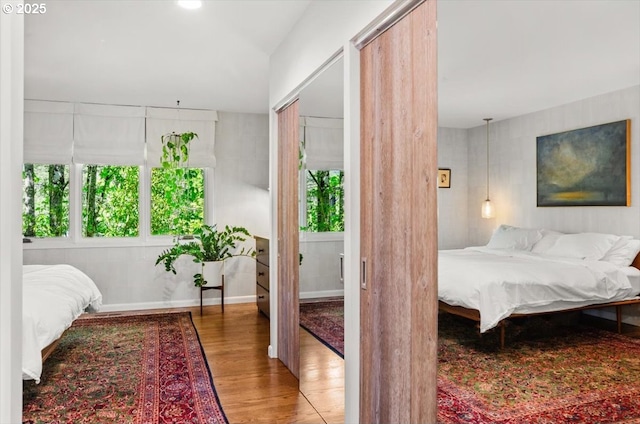 2975 SW Canterbury Ln, Portland, OR 97205 - bedroom with wood finished floors and lofted ceiling