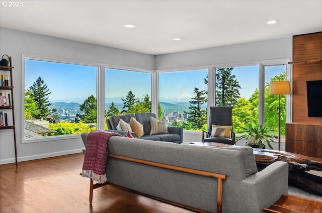 2975 SW Canterbury Ln, Portland, OR 97205 - living room featuring a mountain view, wood finished floors, recessed lighting, and baseboards
