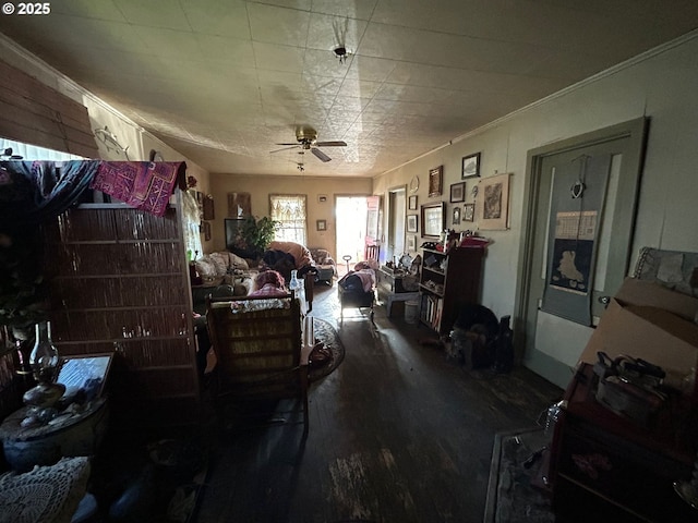 misc room featuring ceiling fan and ornamental molding